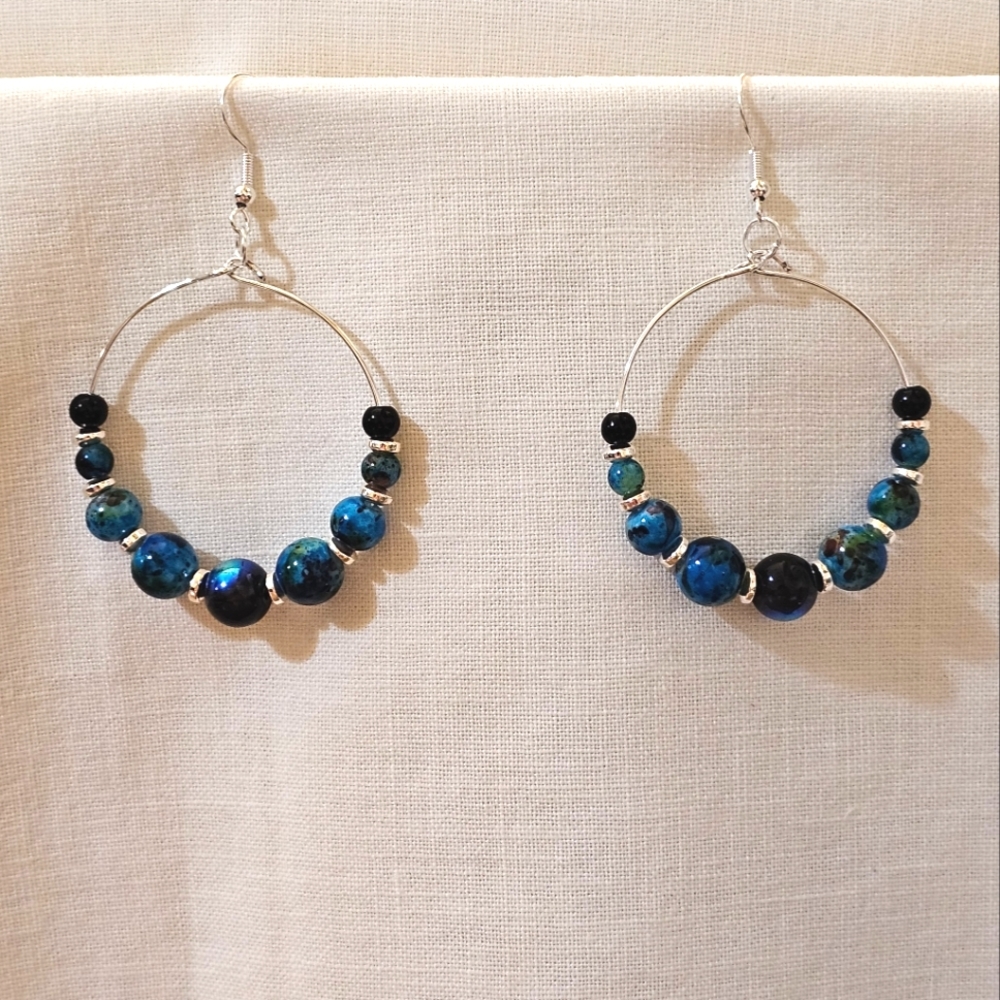 Handmade hoop beaded earrings in multi blue tones with black and silver beads